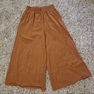 ELODIE- tan smocked wide leg goucho flare pants.